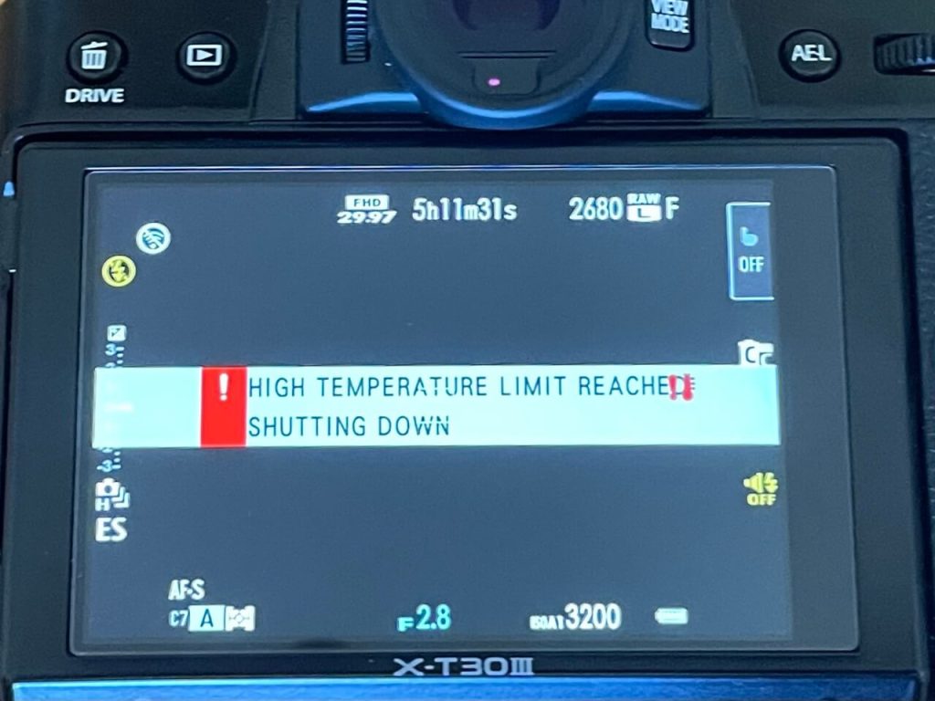 Fujifilm X-T30 III camera screen displaying a 'HIGH TEMPERATURE LIMIT REACHED' warning message.